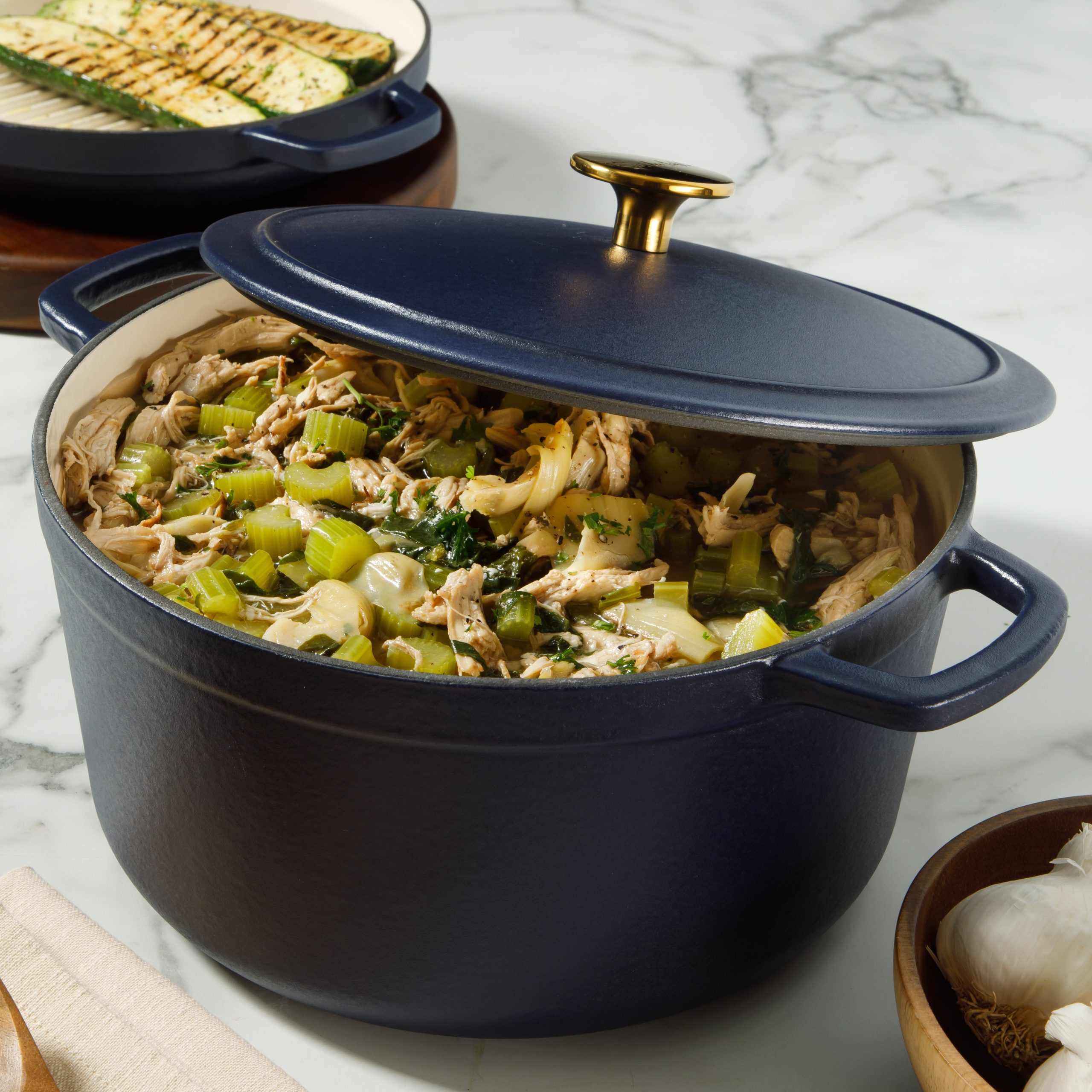 Sur La Table Kitchen Essentials 4-Piece Enameled Cast Iron Stackable Cookware Set, 5.3 Qt Dutch Oven with Lid, Braiser & Grill Pan, Navy Blue, Gold Knob Oven Safe to 500°F, Induction Compatible - Image 3